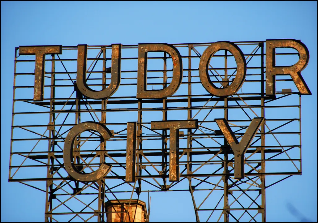 The dark Tudor City rooftop sign